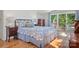 Bedroom with sliding doors leading to a terrace with an American flag at 6664 Lake Shore Dr, Hickory, NC 28601