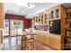Bright kitchen with stainless steel appliances, wood cabinets, and an island at 6664 Lake Shore Dr, Hickory, NC 28601