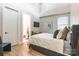 Bright bedroom with ensuite bathroom featuring a comfortable bed and a serene atmosphere for restful nights at 7728 Shalom Dr, Charlotte, NC 28216