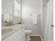 Bright bathroom with single sink vanity and tile floors at 8037 Lynwood Sq, Waxhaw, NC 28173