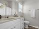 Bright bathroom with single sink vanity and tile floors at 8037 Lynwood Sq, Waxhaw, NC 28173