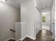 The hallway features hardwood floors and access to rooms at 8037 Lynwood Sq, Waxhaw, NC 28173
