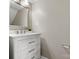 Elegant powder room with modern vanity, mirror, and designer finishes at 8037 Lynwood Sq, Waxhaw, NC 28173