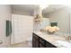 Neutral bathroom with granite countertops, double sinks, shower/tub, and decorative shelving at 8317 Dallas Bay Rd, Charlotte, NC 28278