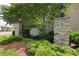 Welcome to Village of Inverness, with its stone pillars, lush landscaping, and iron gate entrance at 8317 Dallas Bay Rd, Charlotte, NC 28278