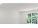 Bright room featuring a window overlooking foliage, hardwood floors and recessed lighting at 8347 Fox Swamp Rd, Charlotte, NC 28215