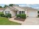 Inviting single-story home with well-kept lawn, complemented by clean lines and an attached garage at 908 Dairy Meadow Ct, Monroe, NC 28110