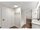 Well-lit bathroom with a shower, a large soaking tub, and a double vanity with a granite countertop at 925 Crestland Dr, Clover, SC 29710