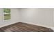 View of the bedroom window with hardwood floors at 925 Crestland Dr, Clover, SC 29710