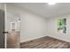 View of bedroom with light hardwood floors and view to the outside at 925 Crestland Dr, Clover, SC 29710
