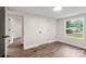 Bedroom with light hardwood floors, window, and closet at 925 Crestland Dr, Clover, SC 29710