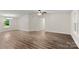Open living room with multiple windows for great views and natural light at 925 Crestland Dr, Clover, SC 29710