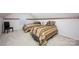 Bedroom features two twin beds with decorative cushions, neutral wall colors, and neutral carpet at 9359 Hillston Ridge Rd, Huntersville, NC 28078