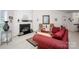 Inviting living room with a cozy fireplace and comfortable furniture at 9359 Hillston Ridge Rd, Huntersville, NC 28078