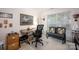 Office features a desk, an office chair, a small sofa and a picture on the wall at 9359 Hillston Ridge Rd, Huntersville, NC 28078