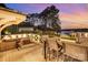 Spacious back deck perfect for outdoor dining and relaxation with lake views at sunset at 108 Balmoral Dr, Mooresville, NC 28117