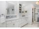 Bathroom featuring marble countertops, double sinks, and custom storage at 108 Balmoral Dr, Mooresville, NC 28117