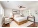 Bedroom with a ceiling fan, wood floors, and a neutral color scheme at 108 Balmoral Dr, Mooresville, NC 28117
