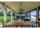 Well-appointed gazebo featuring a dining area, comfortable seating, and picturesque views of the surrounding landscape at 108 Balmoral Dr, Mooresville, NC 28117