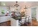 Gourmet kitchen with a large island, granite countertops, and stainless steel appliances at 108 Balmoral Dr, Mooresville, NC 28117