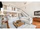 Spacious living room with high ceilings, a cozy fireplace, and stylish decor at 108 Balmoral Dr, Mooresville, NC 28117