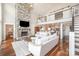 Inviting living room with stone fireplace, hardwood floors, and an open layout at 108 Balmoral Dr, Mooresville, NC 28117