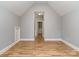 Spacious bedroom with hardwood floors and neutral paint, offering a versatile and inviting atmosphere at 10924 Lederer Ave, Charlotte, NC 28277