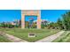 Lovely view of a building exterior through the large monument and green space in front of it at 10924 Lederer Ave, Charlotte, NC 28277