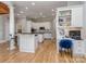 Large kitchen with built-in desk area and stainless appliances at 10924 Lederer Ave, Charlotte, NC 28277