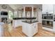 Spacious kitchen with stainless steel appliances, island, breakfast bar, and great natural light at 10924 Lederer Ave, Charlotte, NC 28277