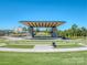 Scenic view of outdoor stage with amphitheater-style seating on landscaped grounds at 10924 Lederer Ave, Charlotte, NC 28277