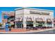 Exterior view of Panera Bread with outdoor patio seating and a Fedex Office in the same building at 10924 Lederer Ave, Charlotte, NC 28277