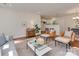 Open concept with living area flowing to kitchen with hardwood floors and bright light at 1147 Norland Rd, Charlotte, NC 28205