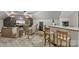 Finished basement featuring cozy seating area, custom bar, and stylish decor at 131 Sierra Woods Dr, Troutman, NC 28166