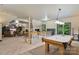 Game room with pool table and space for entertaining or relaxing at 131 Sierra Woods Dr, Troutman, NC 28166