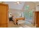 Comfortable bedroom with vaulted ceiling, large windows, and ample natural light at 131 Sierra Woods Dr, Troutman, NC 28166