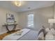 Bright bedroom showcases a table, large window and ample natural light at 1324 E 35Th St, Charlotte, NC 28205