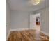 Bedroom featuring hardwood floors, ample space, and an open doorway at 1324 E 35Th St, Charlotte, NC 28205