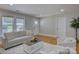 Spacious living room with hardwood floors, neutral paint, and ample natural light at 1324 E 35Th St, Charlotte, NC 28205