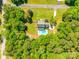 Aerial view of property with pool, shed, landscaped lawn, surrounded by lush trees at 1355 Woodrun Ct, Rock Hill, SC 29732