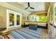 Cozy covered porch with a comfortable seating area and stylish outdoor decor at 1355 Woodrun Ct, Rock Hill, SC 29732