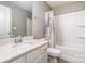 Bright bathroom featuring a tub with shower, white vanity with white countertop, and modern fixtures at 15131 Oleander Dr, Charlotte, NC 28278
