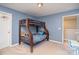 Bright bedroom featuring a bunk bed and ample space at 15131 Oleander Dr, Charlotte, NC 28278