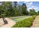 Community bocce ball courts provide an outdoor recreational space with greenery and seating for players and spectators at 15131 Oleander Dr, Charlotte, NC 28278