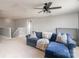 Open living area featuring a comfortable blue couch and neutral decor at 15131 Oleander Dr, Charlotte, NC 28278