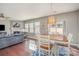 Open living space with hardwood floors, fireplace, and natural light at 15131 Oleander Dr, Charlotte, NC 28278
