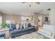 Spacious living room flows into kitchen with white cabinets and stainless appliances at 15131 Oleander Dr, Charlotte, NC 28278