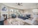 Comfortable living room featuring a fireplace, hardwood floors, and contemporary furnishings at 15131 Oleander Dr, Charlotte, NC 28278