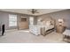A spacious main bedroom featuring light grey walls and ample natural light from the many windows at 15131 Oleander Dr, Charlotte, NC 28278