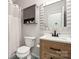 Well-lit bathroom with modern vanity and a shower with curtain at 1622 Candlewood Ridge Ln, Matthews, NC 28105